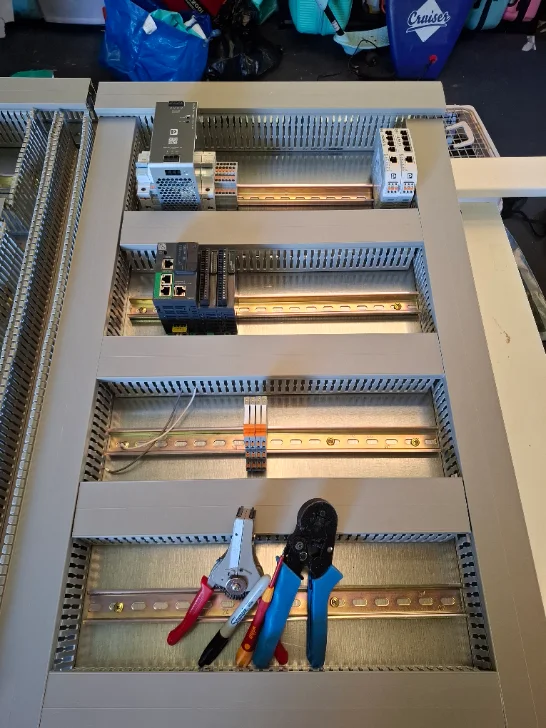 Distributed IO panel mid-build — Beckhoff coupler, Phoenix Contact 24 V and IO terminations