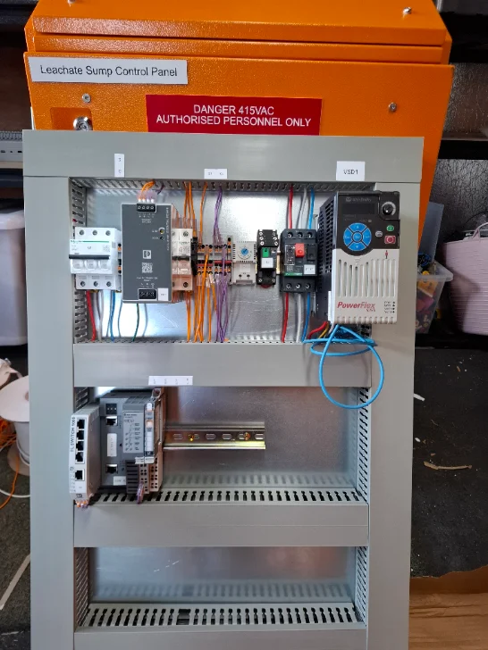 Leachate Sump Control Panel — workshop build with motor starter, PowerFlex VSD and managed switch on DIN rail